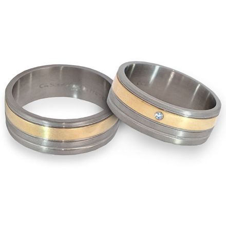 Gifteringer i stål & gult gull, 7 mm. RAUSCHMAYER - 1160027 Gifteringer i stål & gult gull, 7 mm. RAUSCHMAYER - 1160027