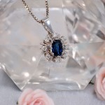 Diamantsmykke i gull med 0,12 ct TW-Si & safir - bur272050