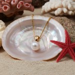 Smykke i 14kt gull med perle - coc7508