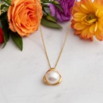 Smykke i 14kt gull med perle - bur210928