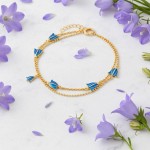 Armbånd i forgylt sølv med blå blåklokke. LIV - 750212