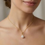 Gullsmykke med ferksvannsperle 9,5-10mm - Bur2090perle