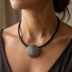 Smykke i tinn Slow. HILLESTAD - AB316T