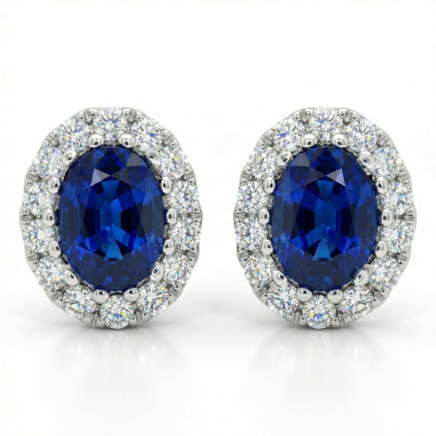 Diamantøredobber i gull 18 kt med 0,11 ct W-SI og safir-7500130