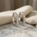 Diamantøredobber i gull med 0,75 ct W-Si -BUR734862